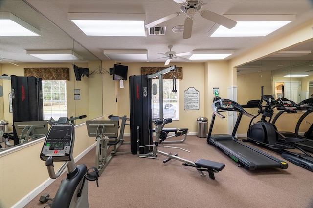 gym featuring ceiling fan