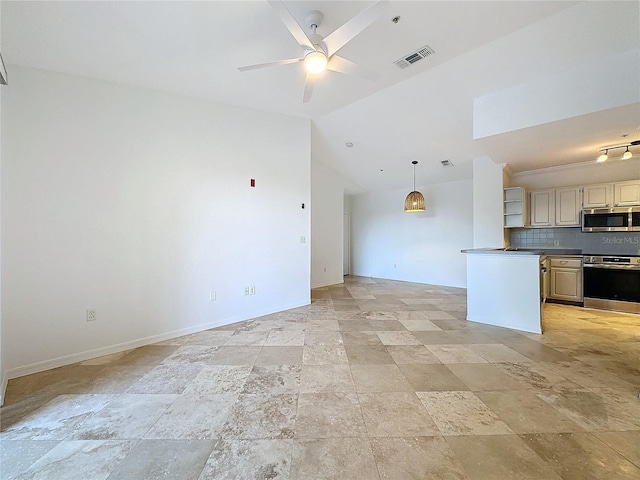 unfurnished living room with ceiling fan and lofted ceiling