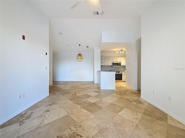 unfurnished living room with ceiling fan