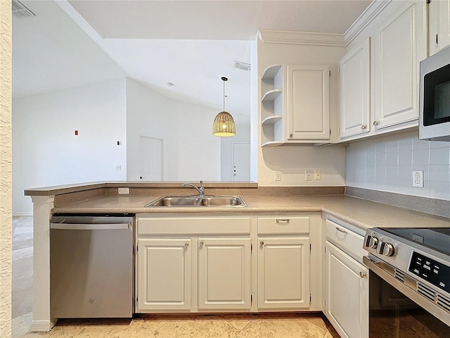 kitchen with sink, white cabinetry, appliances with stainless steel finishes, kitchen peninsula, and pendant lighting