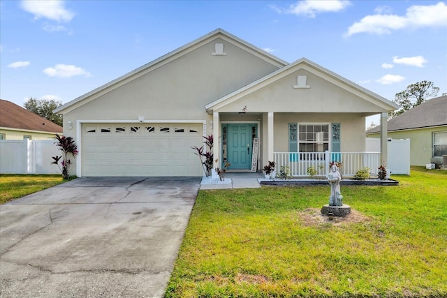 ranch-style house featuring a garage, a front lawn, and covered porch