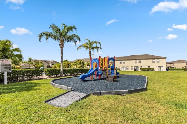 view of playground with a yard