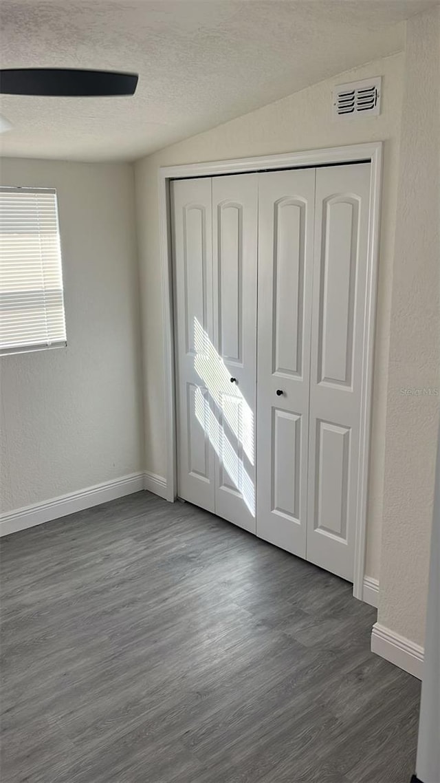 foyer with dark hardwood / wood-style floors