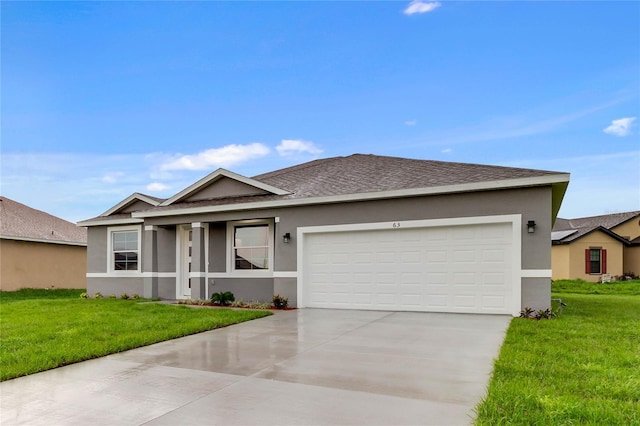 ranch-style home with a garage and a front yard