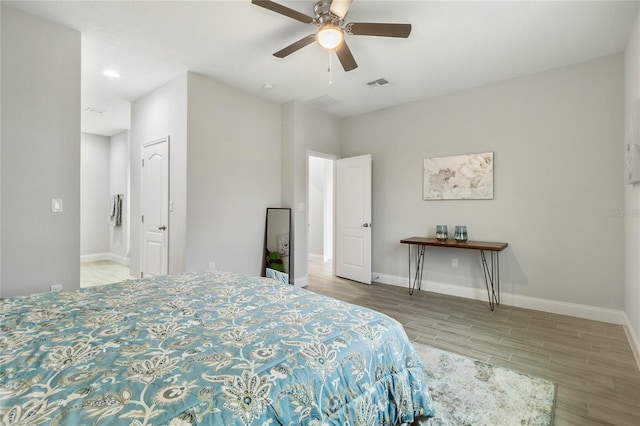 bedroom featuring wood-type flooring and ceiling fan