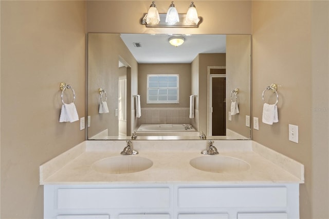 bathroom with vanity and plus walk in shower