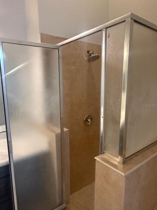 228 Remington Pl, Haines City, FL 33844 - full bathroom featuring tiled shower and vanity