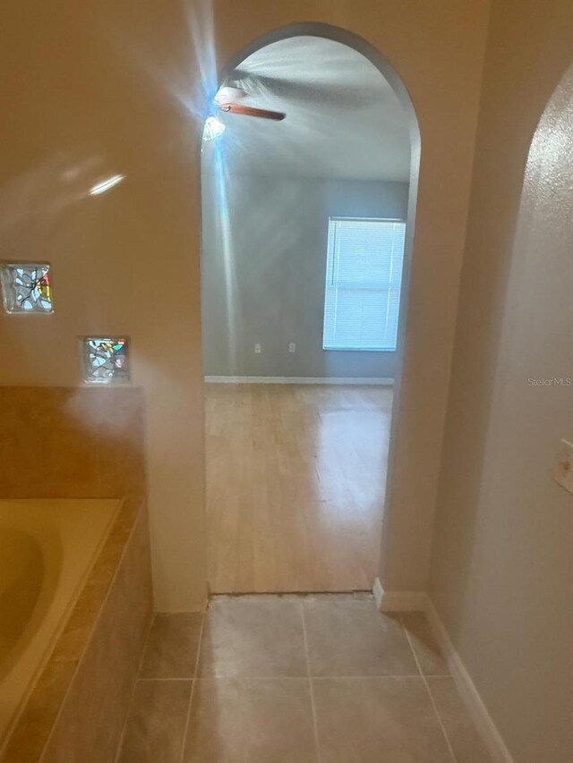 228 Remington Pl, Haines City, FL 33844 - bathroom featuring tile patterned flooring and a ceiling fan