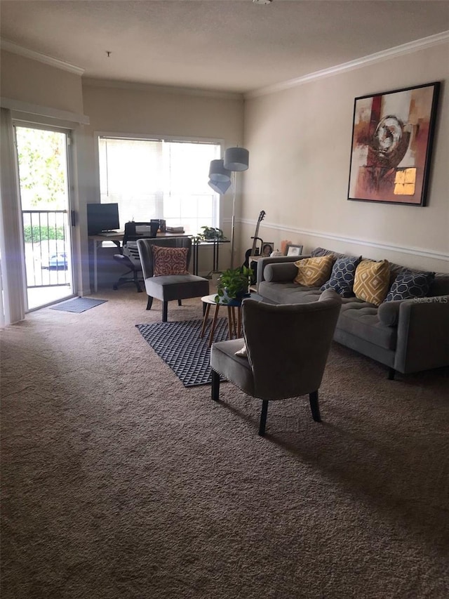 living room featuring ornamental molding, plenty of natural light, and carpet flooring