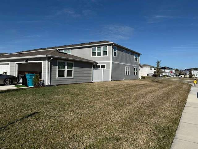 view of side of property featuring a lawn