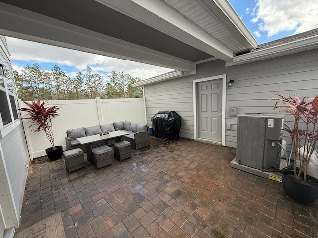 view of patio / terrace featuring cooling unit, grilling area, and outdoor lounge area