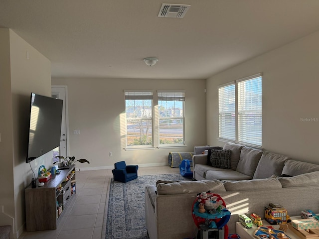 living room featuring light tile patterned floors