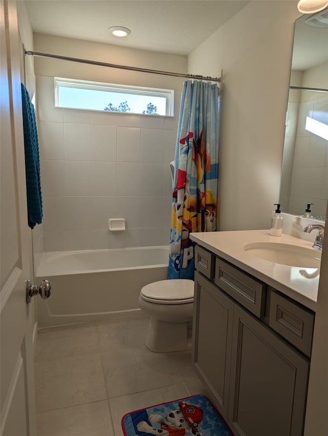 full bathroom featuring vanity, toilet, tile patterned floors, and shower / tub combo with curtain