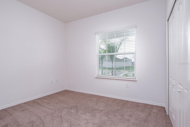 empty room with carpet floors