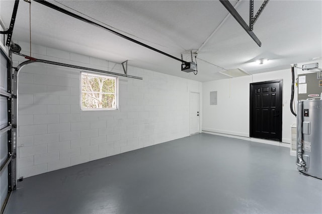 garage featuring a garage door opener, electric water heater, and electric panel