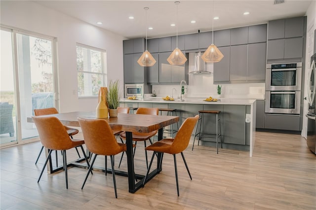 dining area featuring light hardwood / wood-style flooring