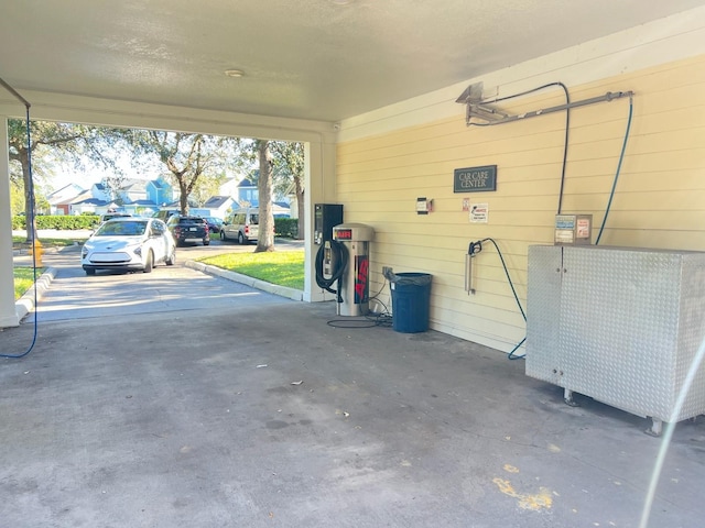 garage featuring a carport