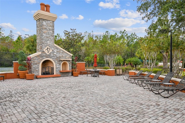 view of property's community with a patio