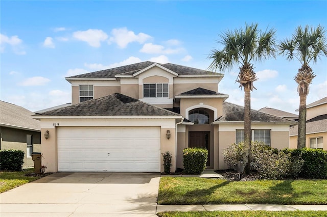 front facade with a garage