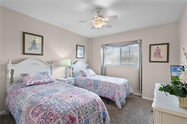 bedroom featuring ceiling fan, carpet flooring, and a textured ceiling