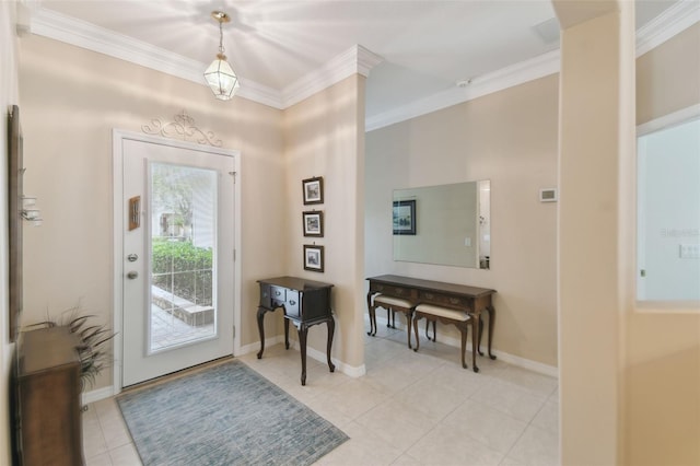 tiled foyer with ornamental molding