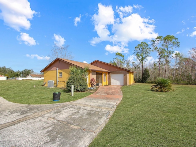 ranch-style house with central AC unit, a garage, and a front lawn