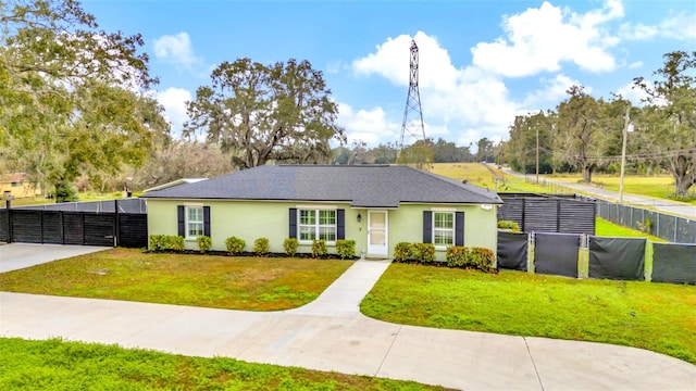 ranch-style home with a front yard