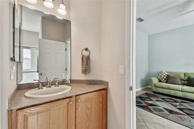 bathroom featuring vanity and tile patterned floors