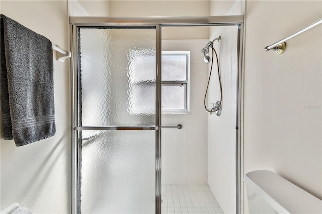 bathroom featuring walk in shower