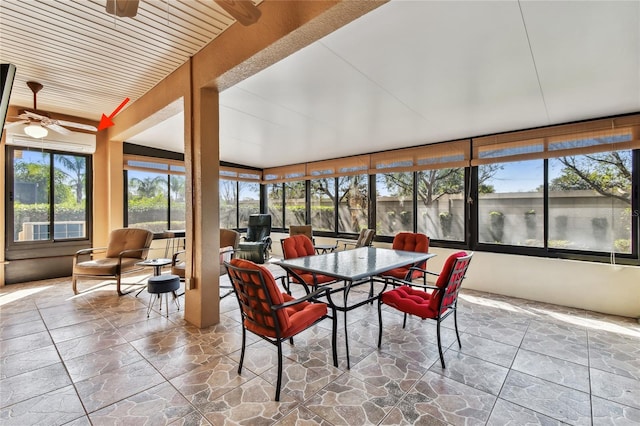 sunroom / solarium with ceiling fan