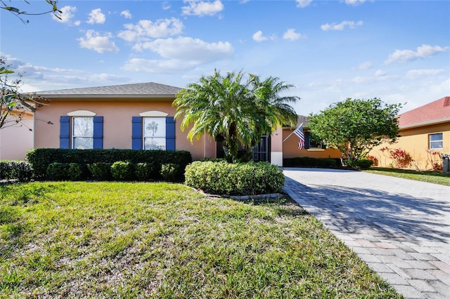 view of front of home with a front yard