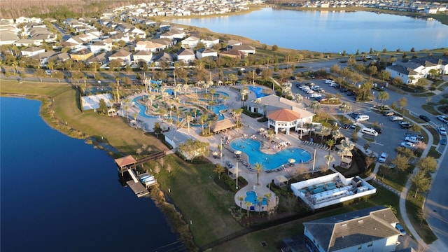 aerial view featuring a water view and a residential view