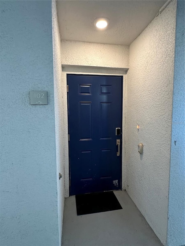 3180 Paradox Cir Unit 102, Kissimmee, FL 34746 - property entrance with stucco siding