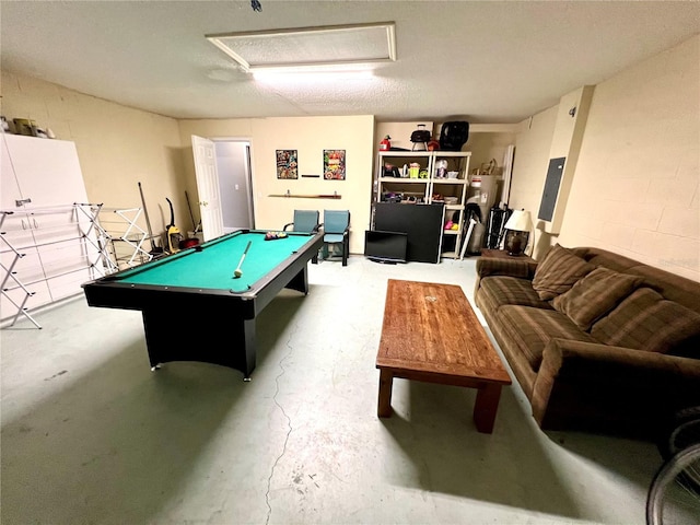 rec room featuring pool table and a textured ceiling