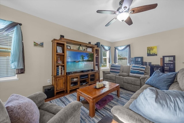 living room featuring hardwood / wood-style flooring and ceiling fan