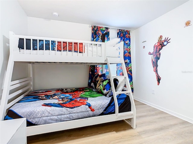 bedroom featuring hardwood / wood-style floors