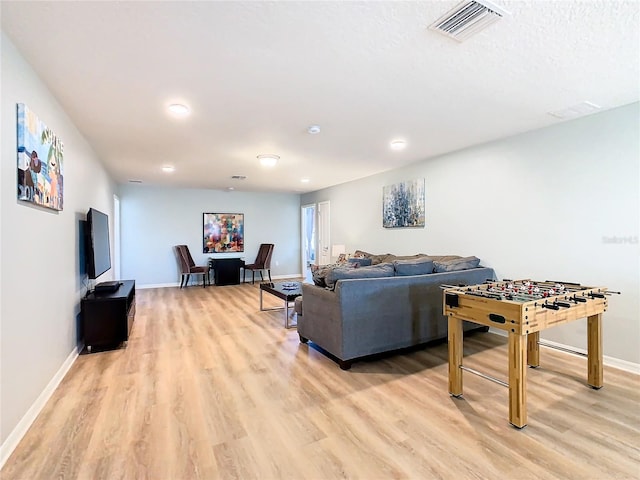 living room featuring light hardwood / wood-style flooring