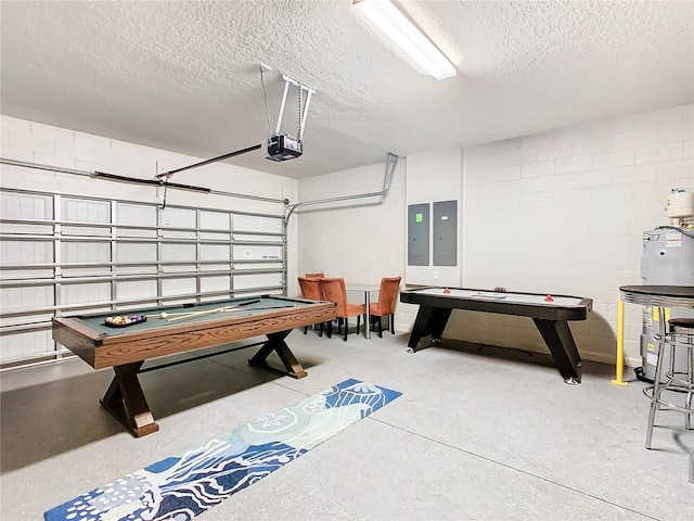 game room with electric panel and a textured ceiling