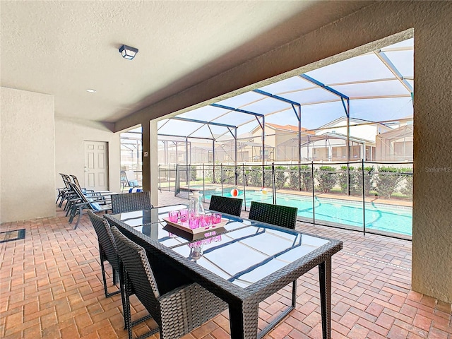 view of patio with a lanai