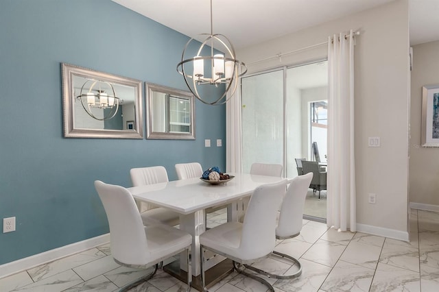 dining space featuring an inviting chandelier