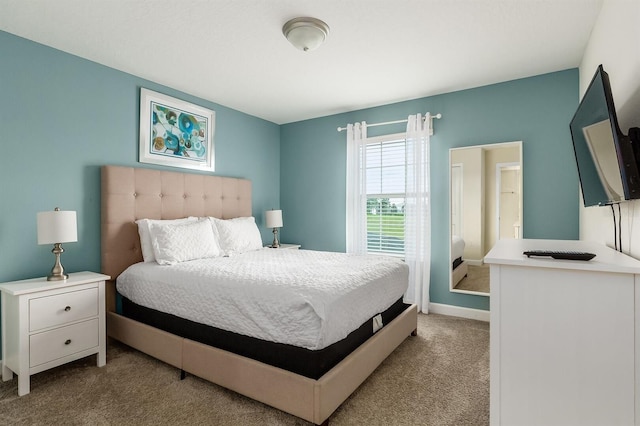 bedroom featuring light colored carpet