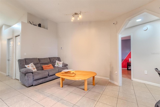 living room with light tile patterned floors