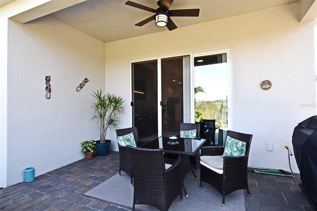 view of patio with ceiling fan