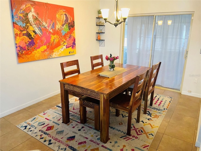 tiled dining area with a notable chandelier