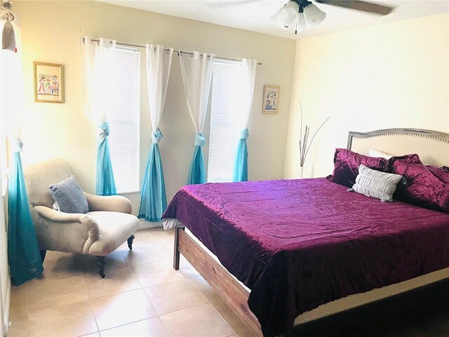 bedroom featuring light tile patterned floors