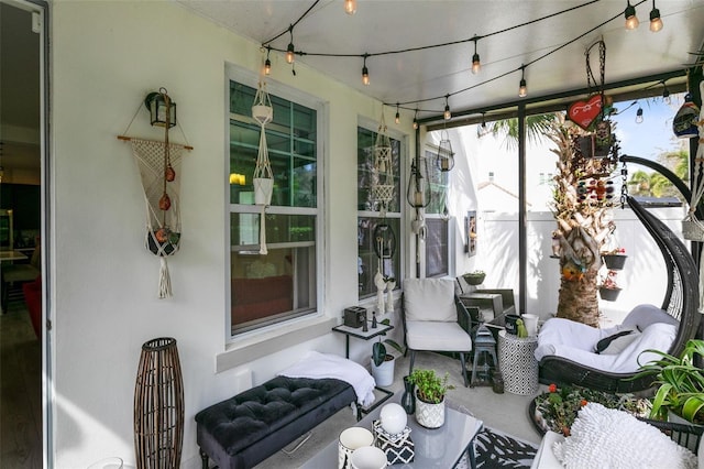 sunroom with track lighting