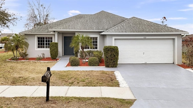 ranch-style home with a garage