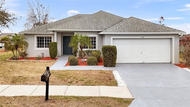 single story home with a garage