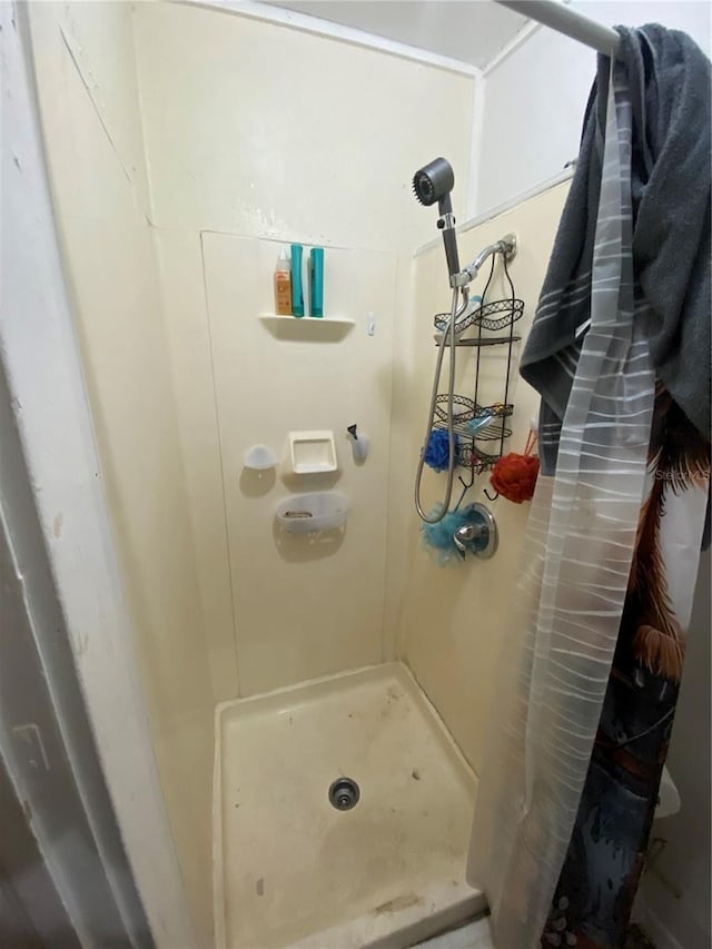 bathroom featuring walk in shower