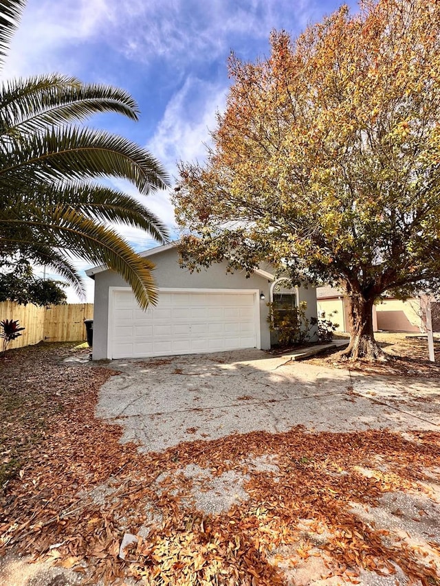 view of property exterior with a garage